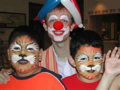 face painter with customers
